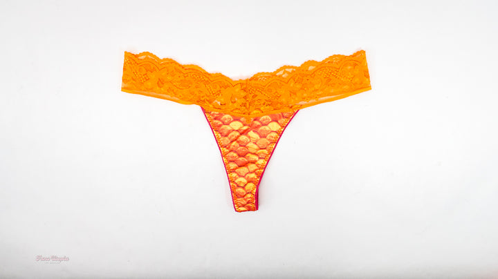 Cherie DeVille Orange Thong + Polaroid